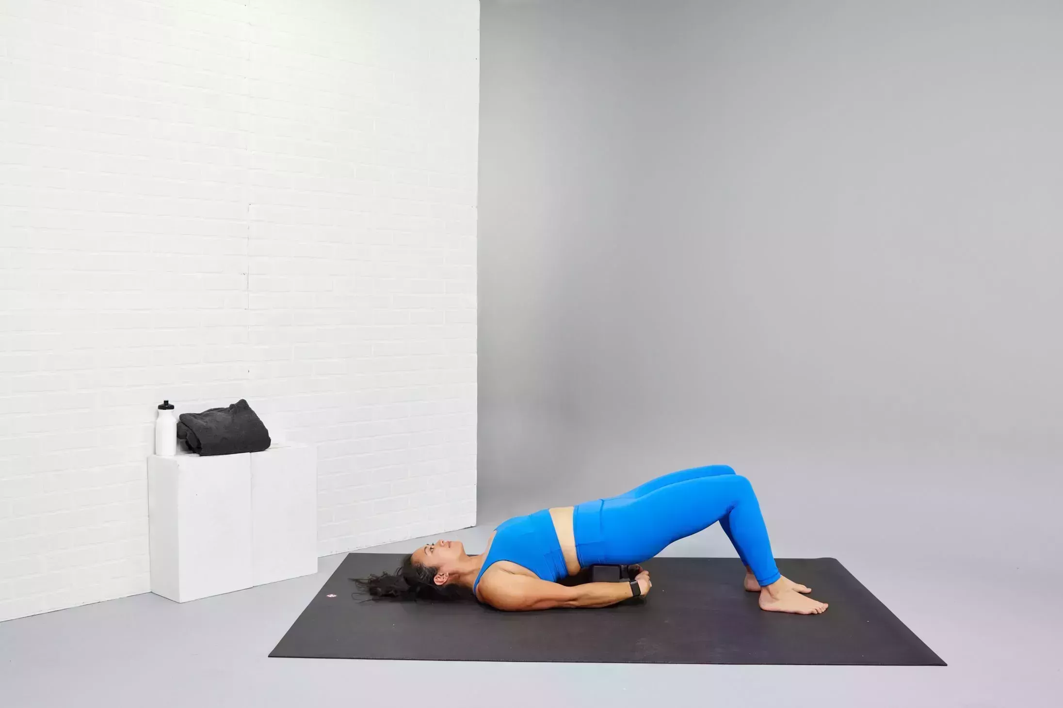 restorative yoga poses, supported bridge