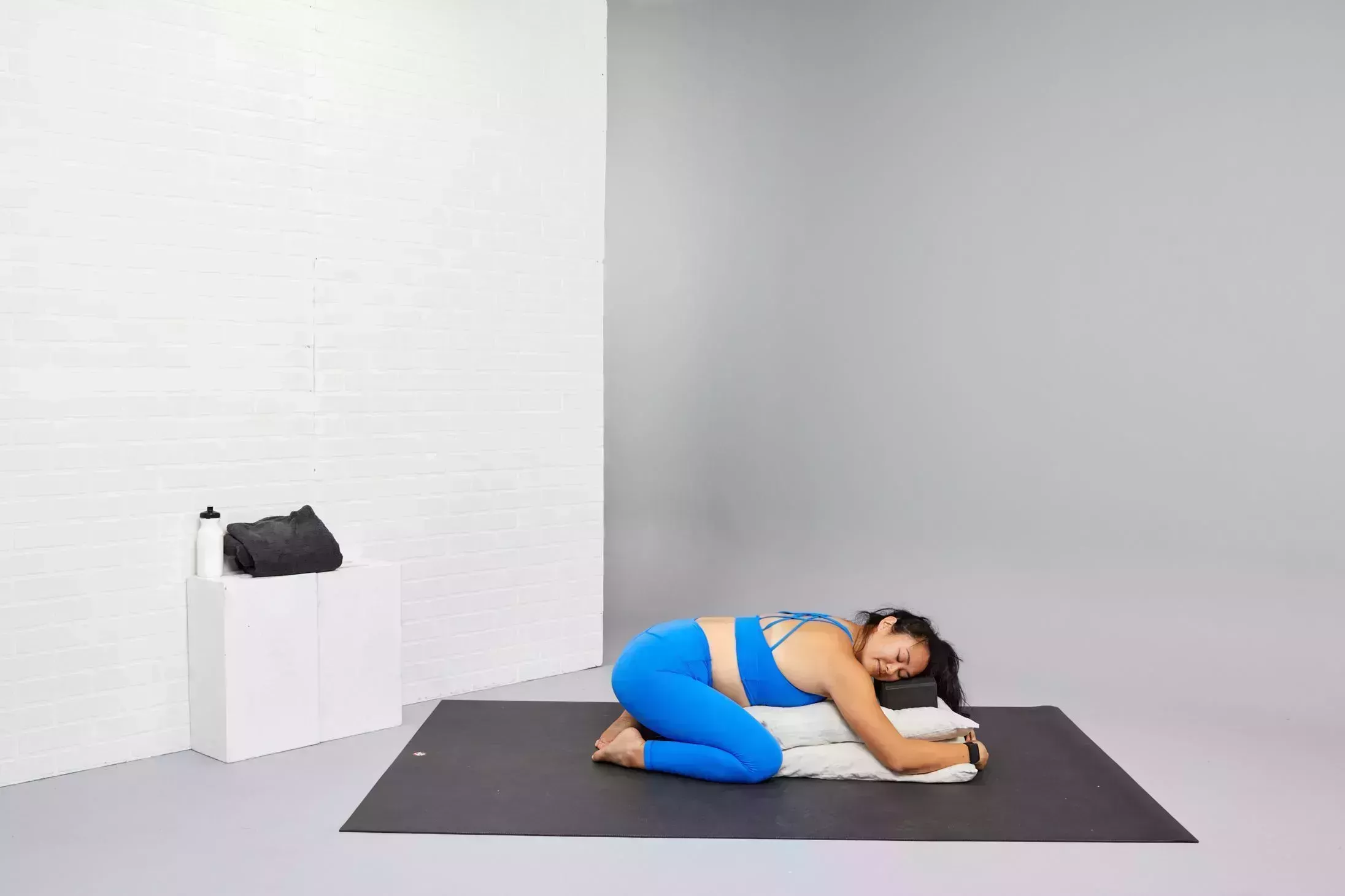 restorative yoga poses, supported child's pose