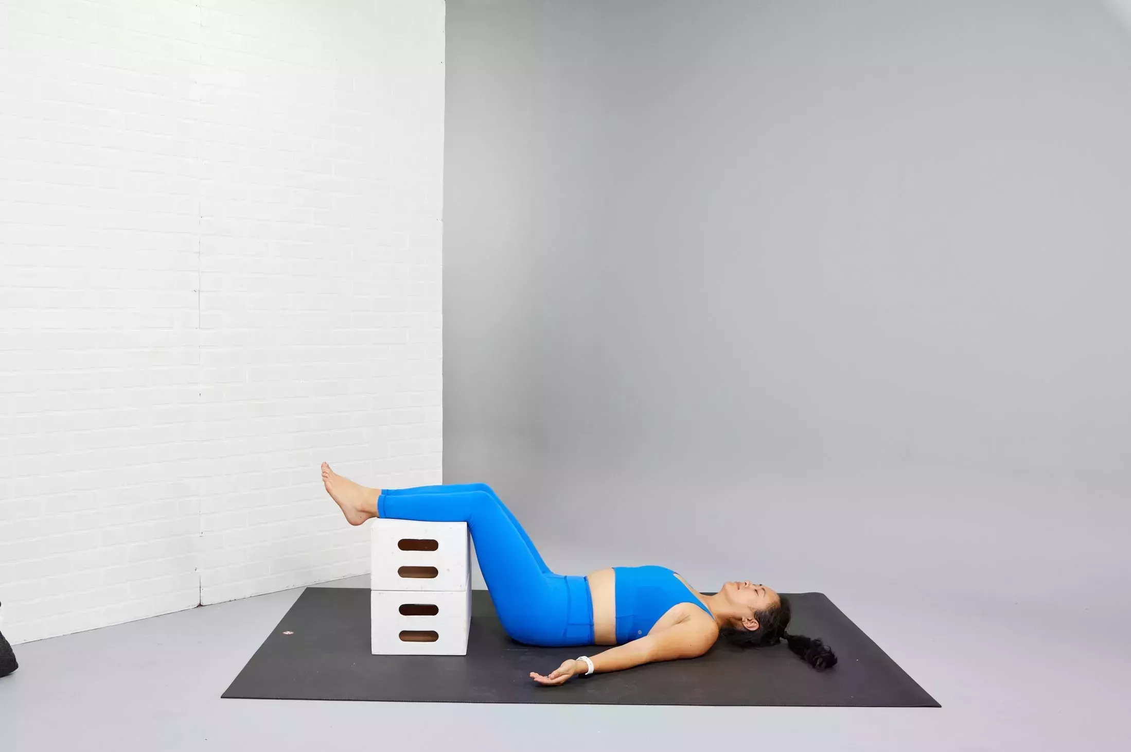 restorative yoga poses, supported savasana