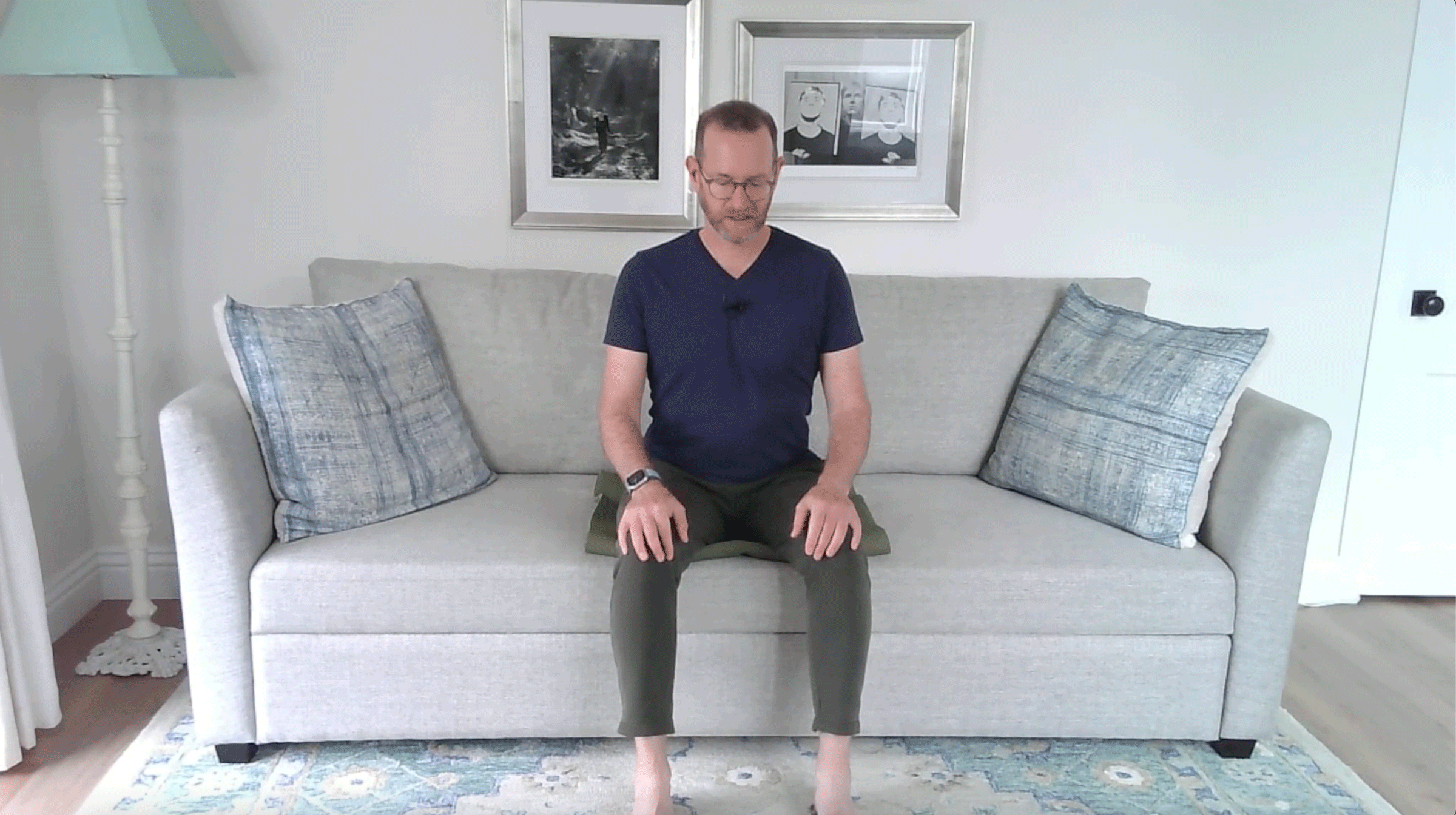 A Quick Couch Yoga Practice (Yes, Couch) for When You Want to Stay Sitting