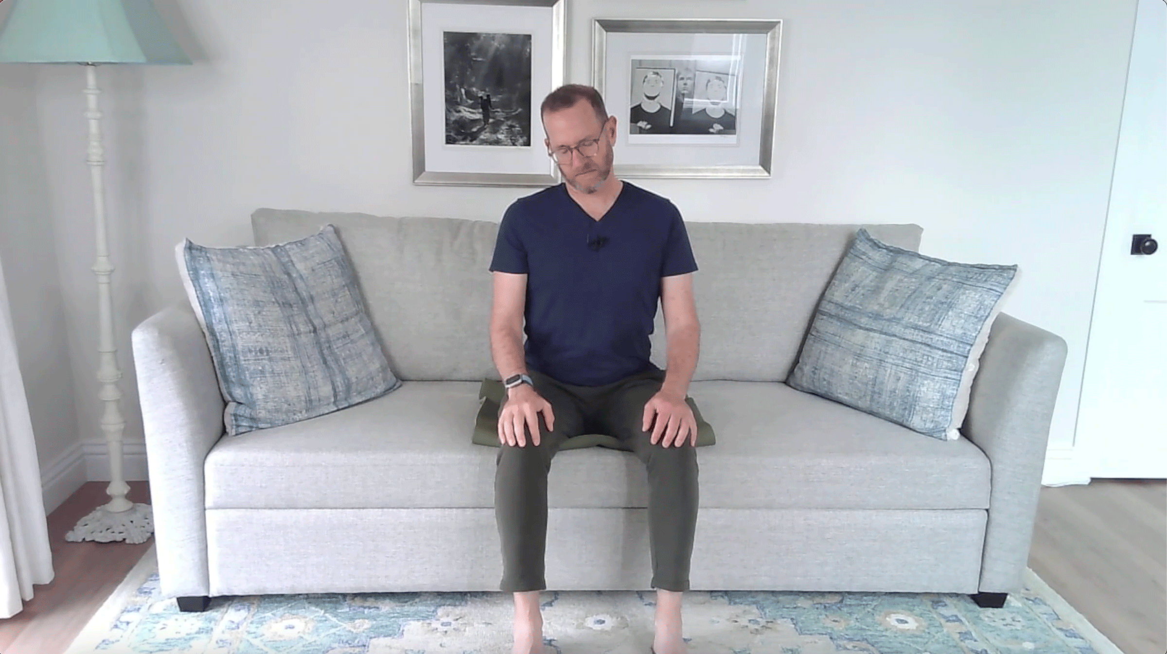 A Quick Couch Yoga Practice (Yes, Couch) for When You Want to Stay Sitting