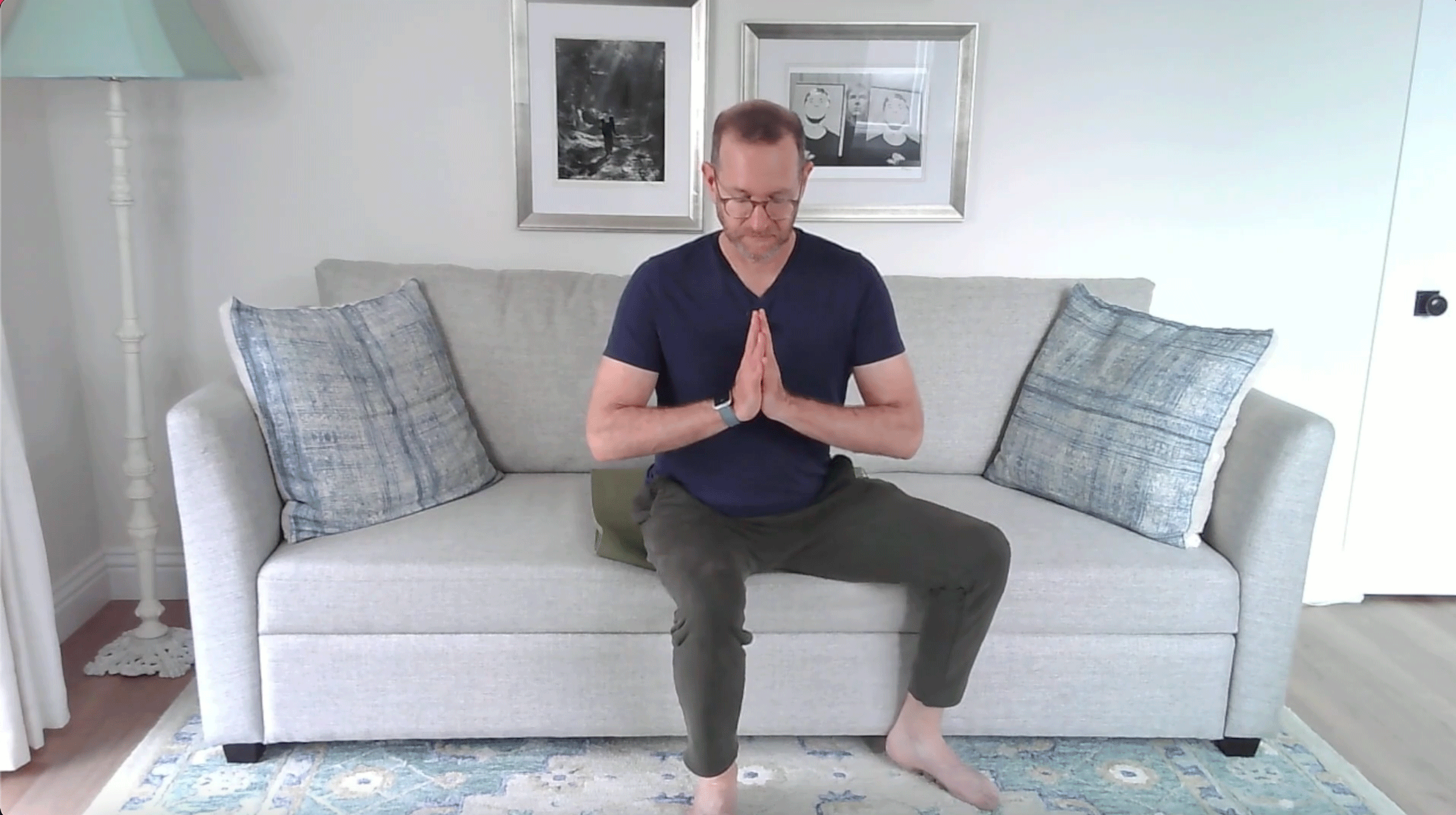 A Quick Couch Yoga Practice (Yes, Couch) for When You Want to Stay Sitting