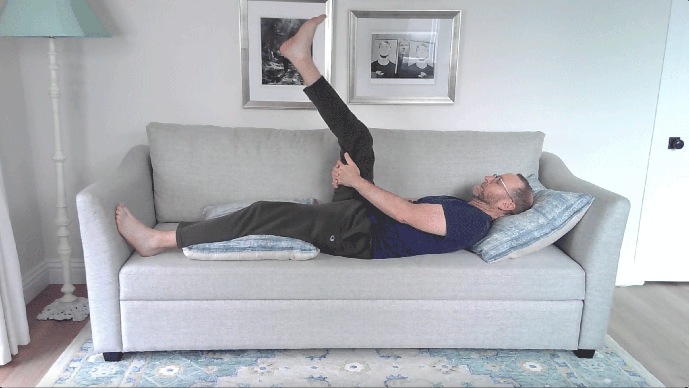 A Quick Couch Yoga Practice (Yes, Couch) for When You Want to Stay Sitting