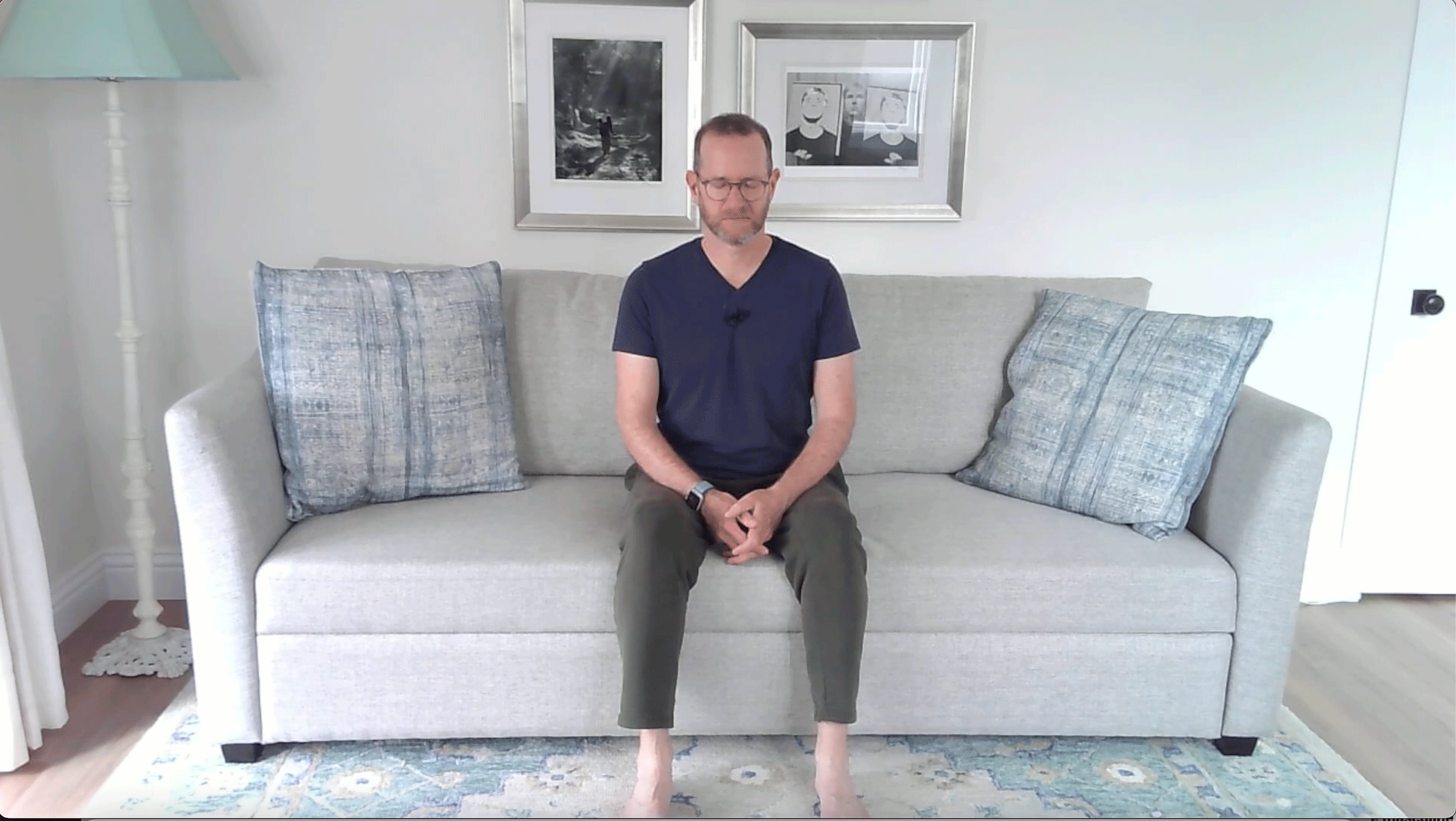 A Quick Couch Yoga Practice (Yes, Couch) for When You Want to Stay Sitting