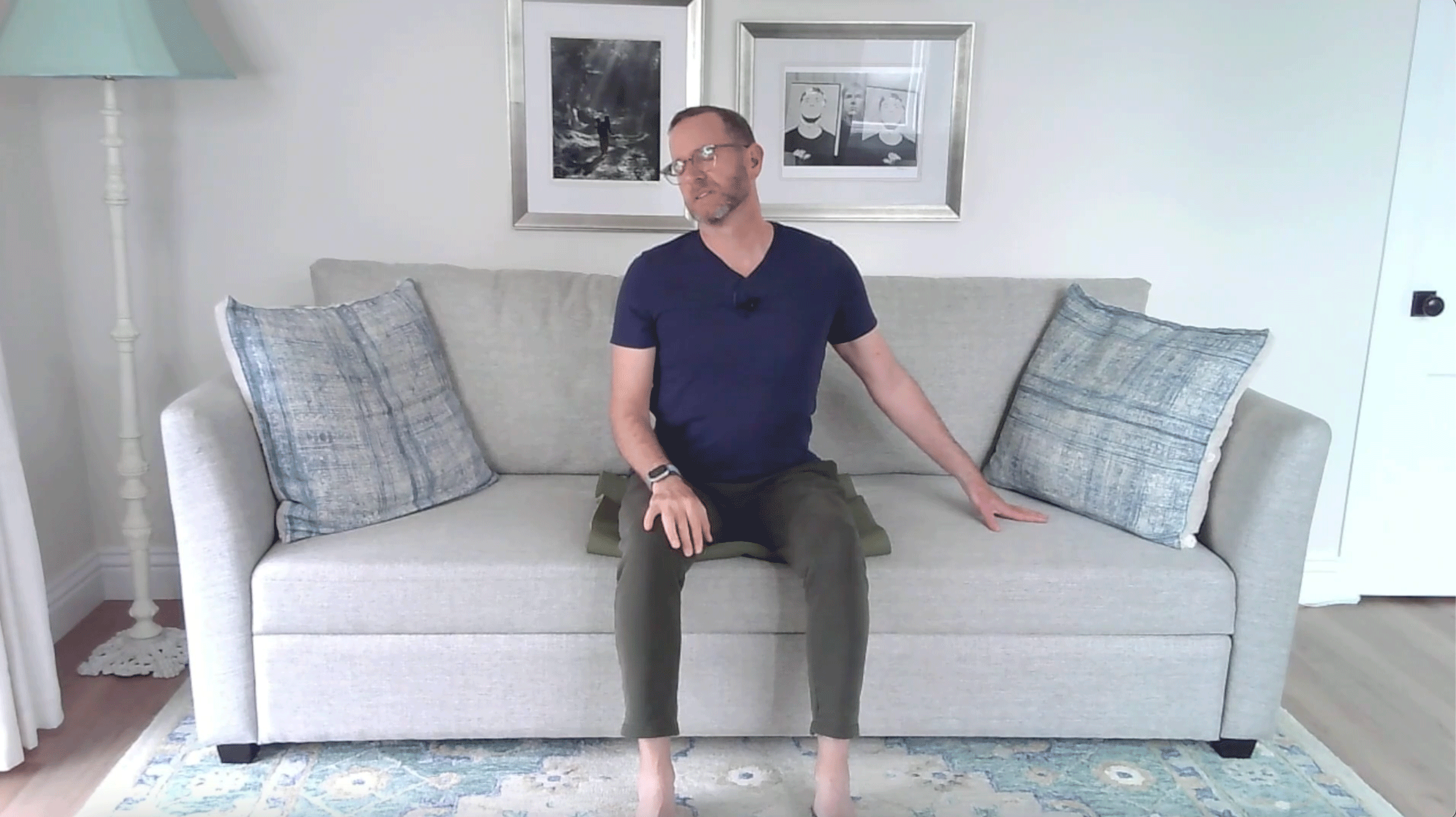 A Quick Couch Yoga Practice (Yes, Couch) for When You Want to Stay Sitting