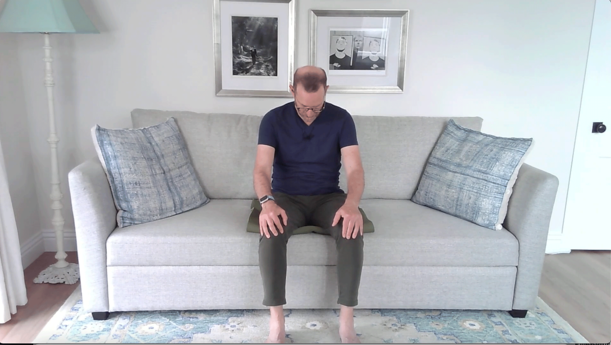 A Quick Couch Yoga Practice (Yes, Couch) for When You Want to Stay Sitting