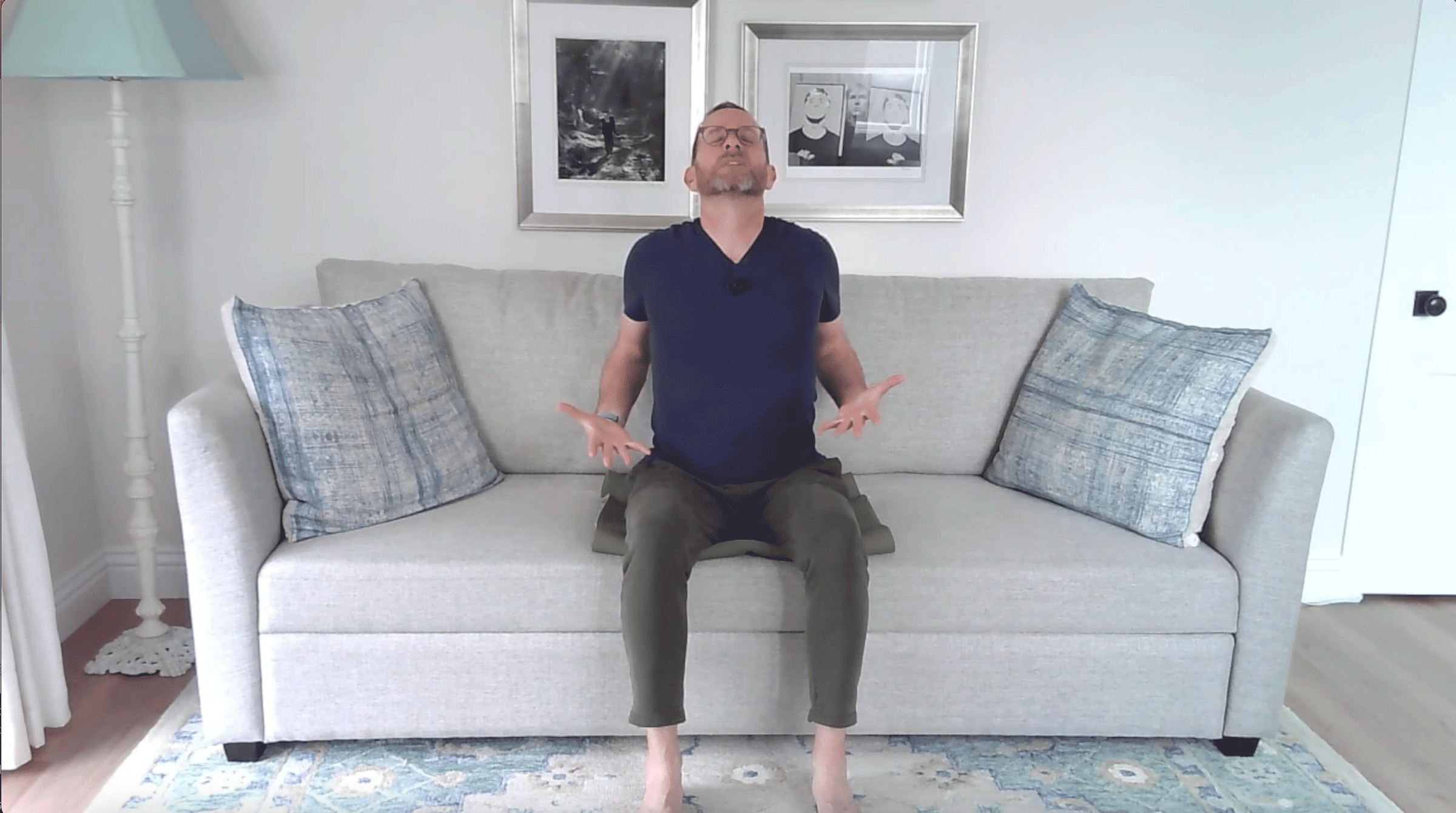 A Quick Couch Yoga Practice (Yes, Couch) for When You Want to Stay Sitting