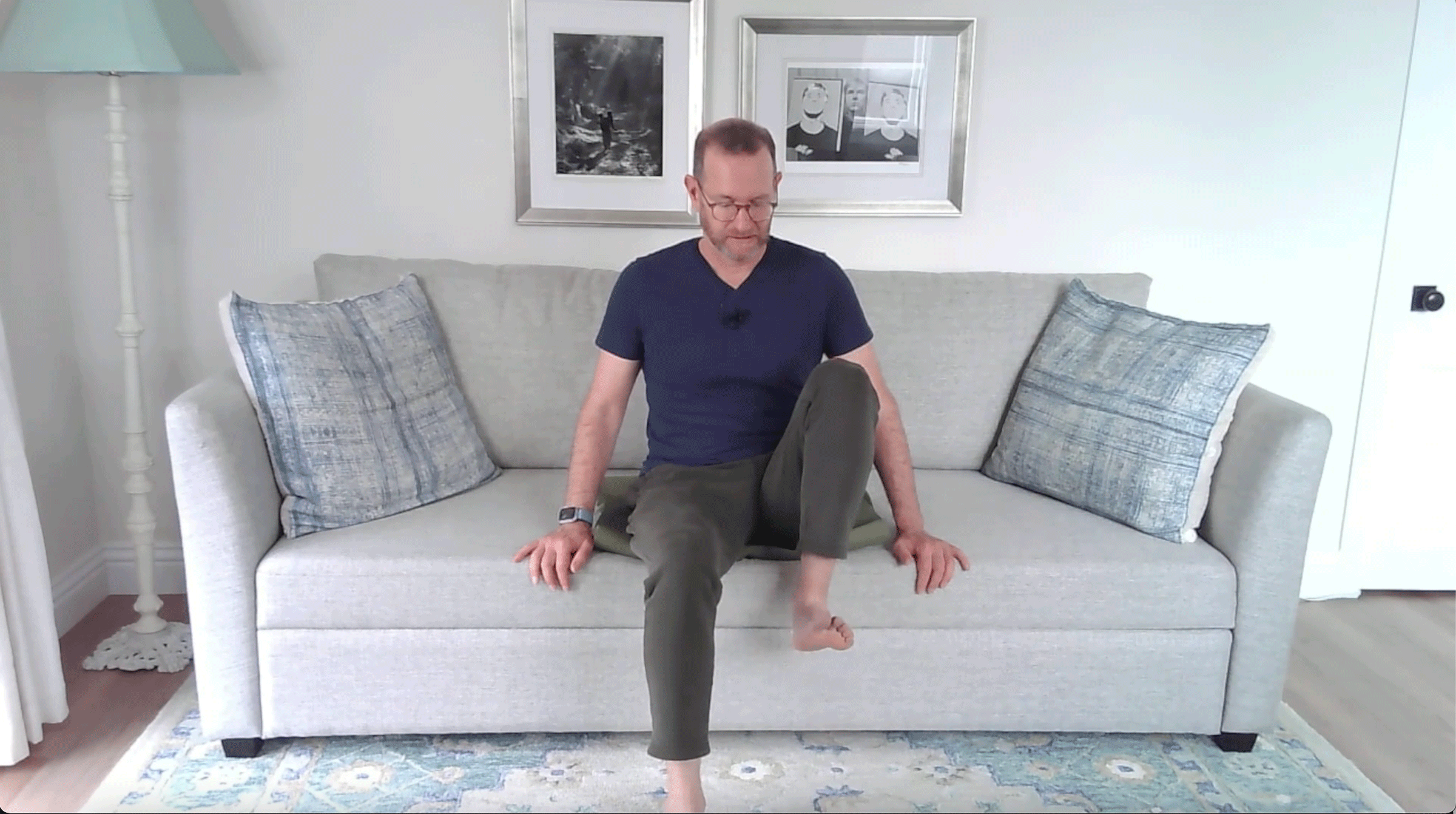 A Quick Couch Yoga Practice (Yes, Couch) for When You Want to Stay Sitting