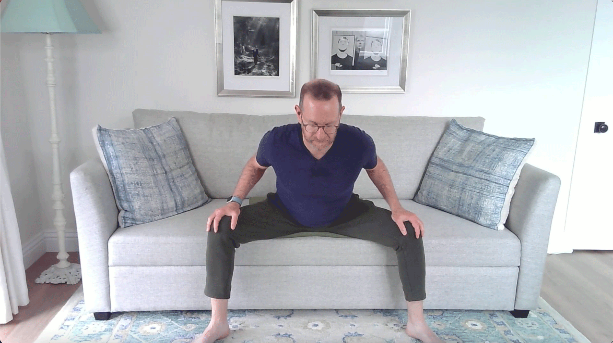 A Quick Couch Yoga Practice (Yes, Couch) for When You Want to Stay Sitting