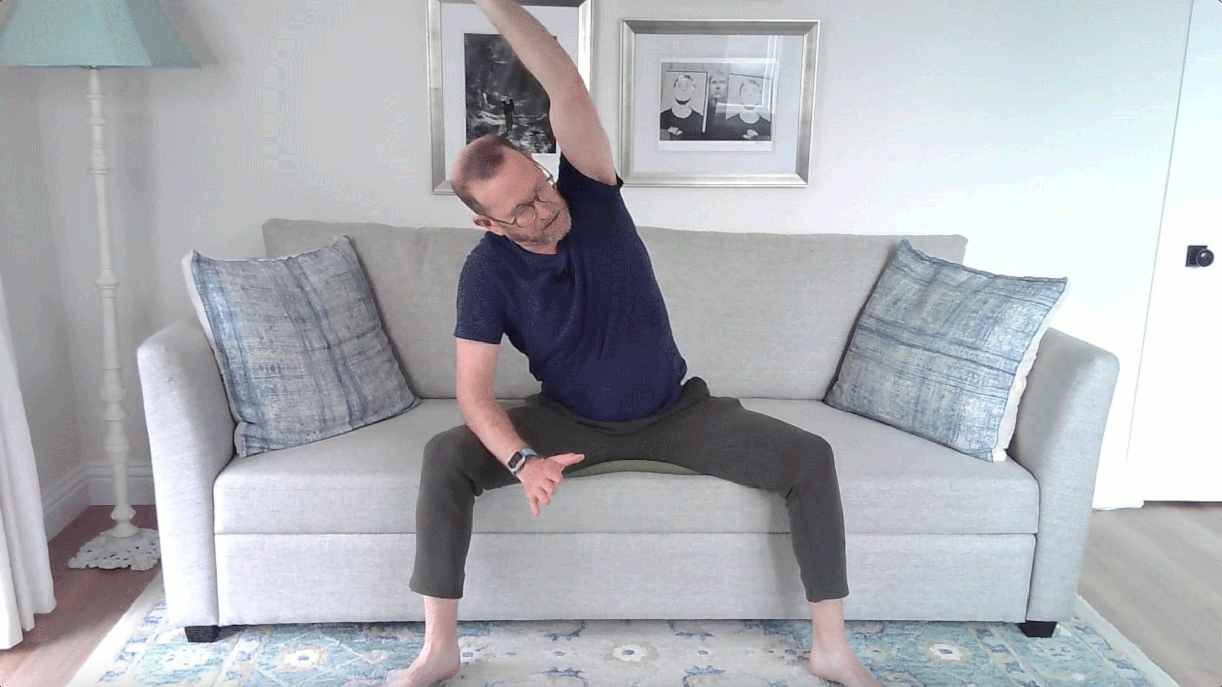 A Quick Couch Yoga Practice (Yes, Couch) for When You Want to Stay Sitting